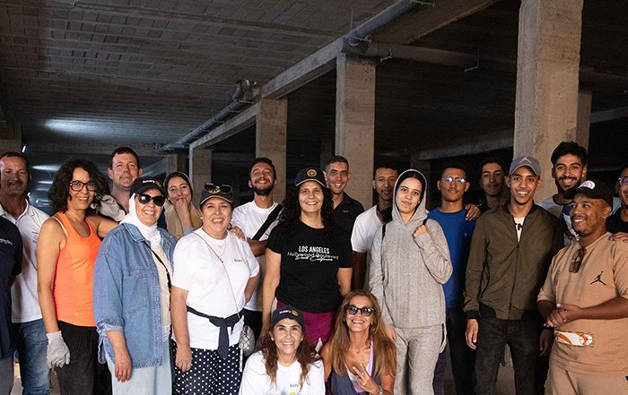 ShelterBox team members and Rotary volunteers in a warehouse in Morocco