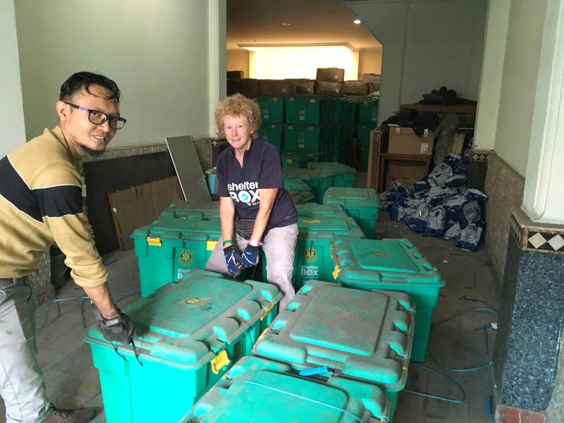 ShelterBox Response Team members sorting aid in Indonesia