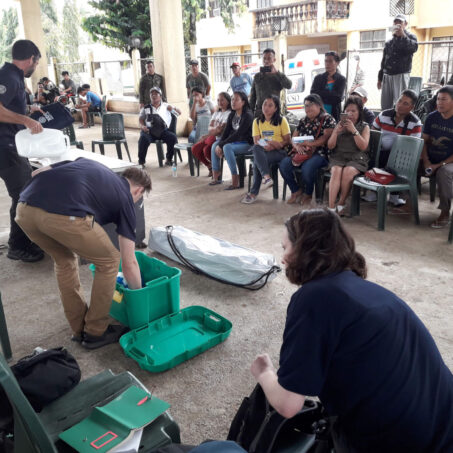 people demonstrating aid in the Philippines