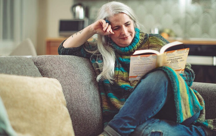 woman reading shelterbox book club book