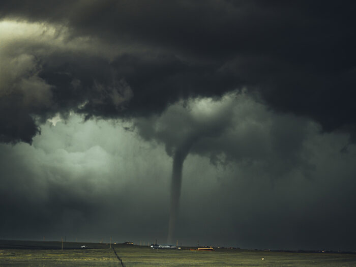 tornado or twister over a field