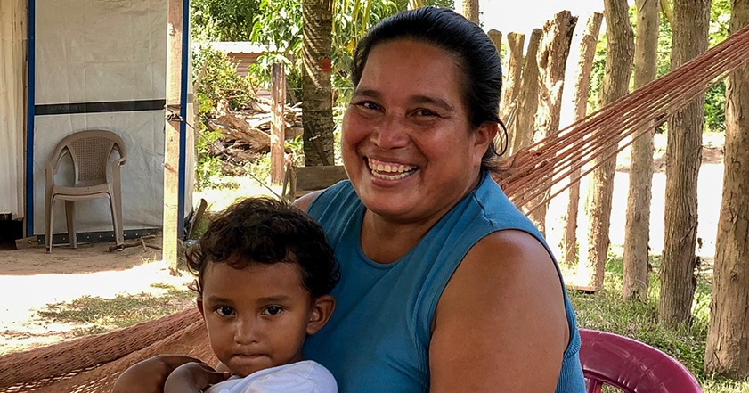 Woman holding a child in Honduras