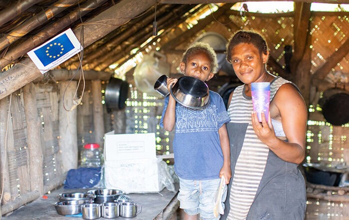 Woman and child in their home in Vanuatu