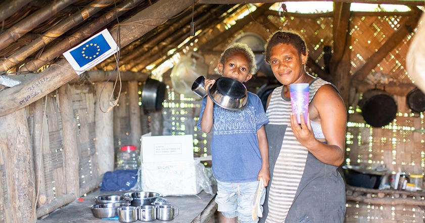 Woman and child in their home in Vanuatu