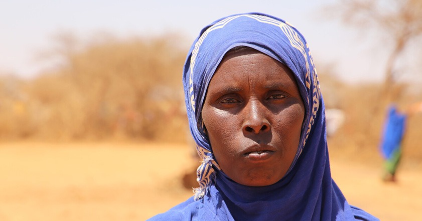 Woman wearing purple headscarf in Somaliland