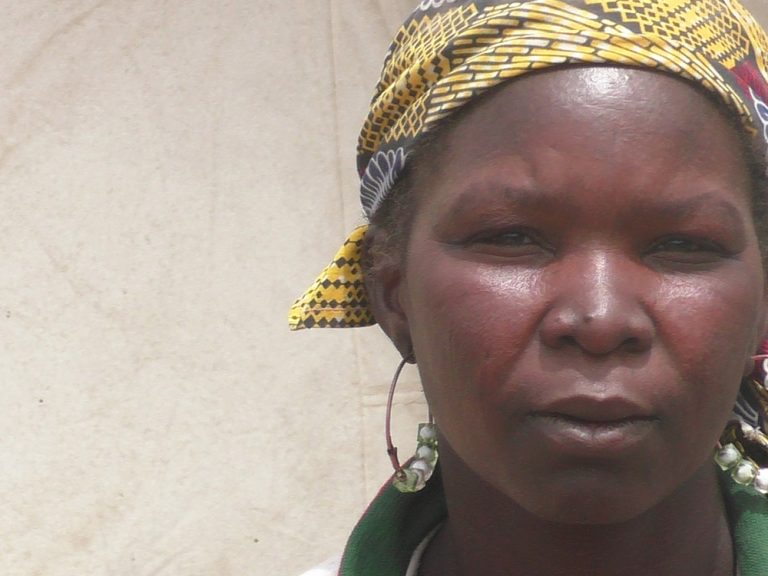 Woman wearing yellow headscarf
